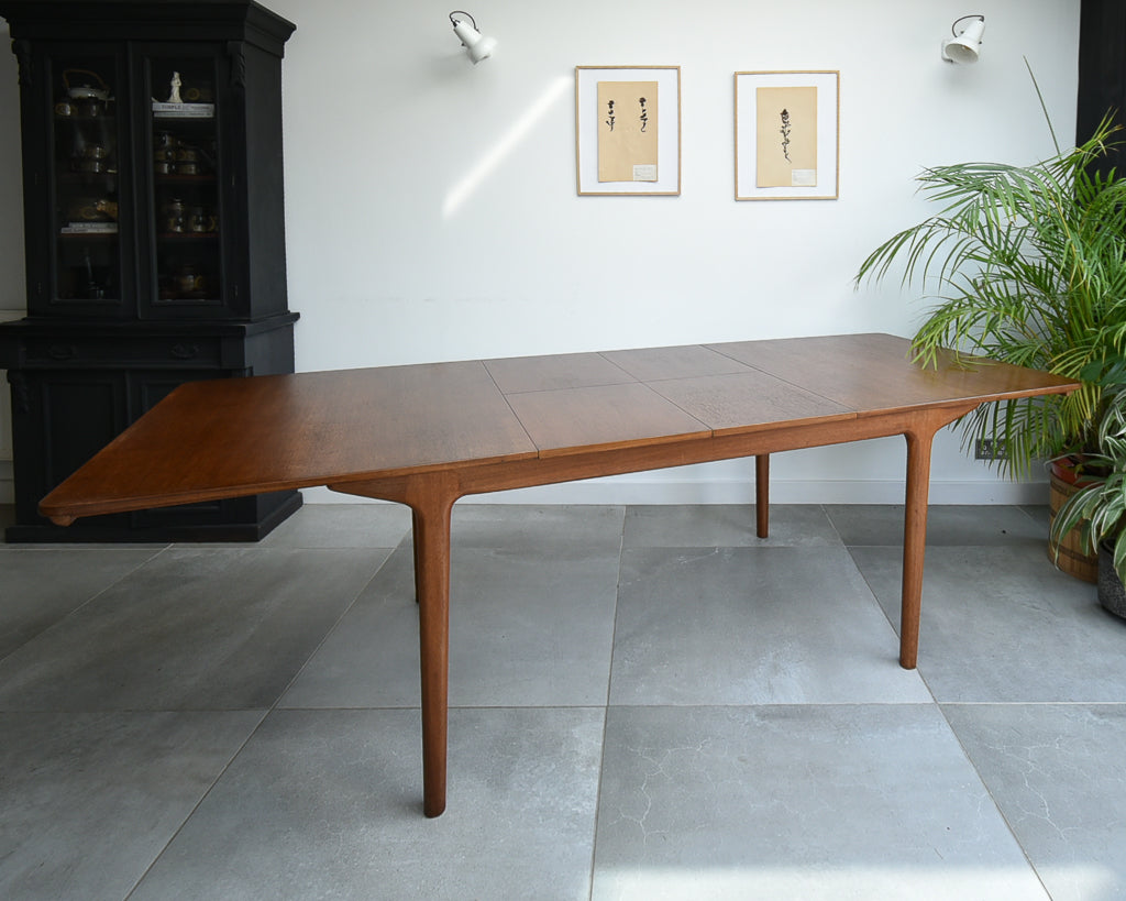 Mid Century Teak Extending Ten-Seater Dining Table and Six Chairs