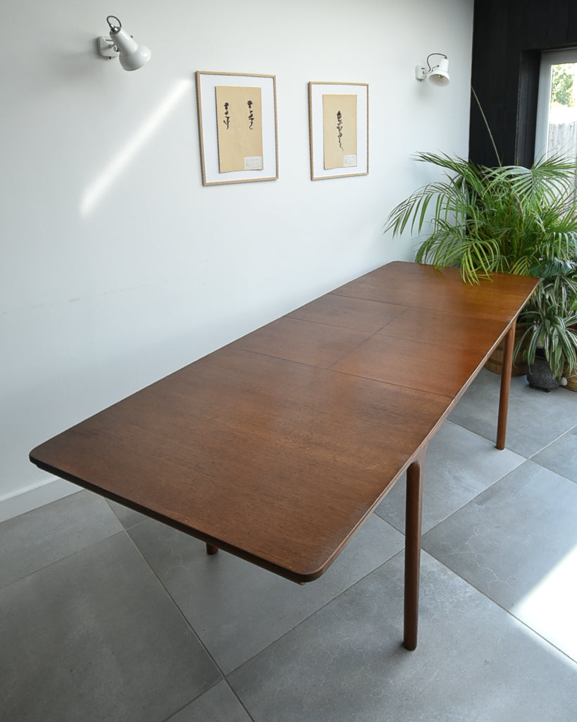 Mid Century Teak Extending Ten-Seater Dining Table and Six Chairs