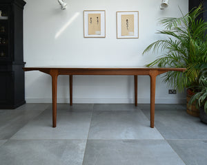 Mid Century Teak Extending Ten-Seater Dining Table and Six Chairs