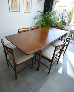Mid Century Teak Extending Ten-Seater Dining Table and Six Chairs