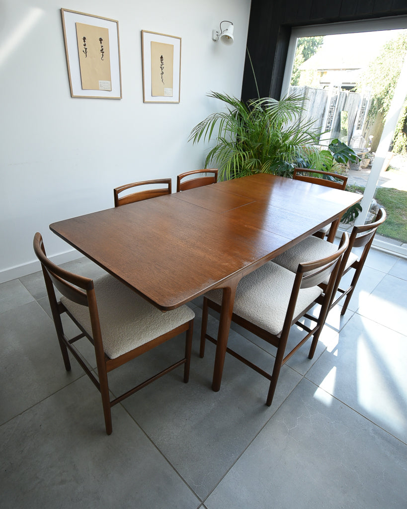Mid Century Teak Extending Ten-Seater Dining Table and Six Chairs