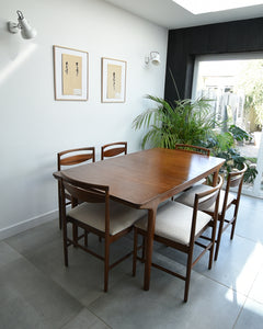 Mid Century Teak Extending Ten-Seater Dining Table and Six Chairs