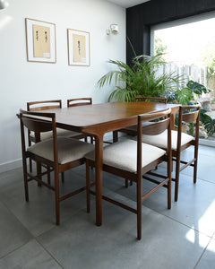 Mid Century Teak Extending Ten-Seater Dining Table and Six Chairs