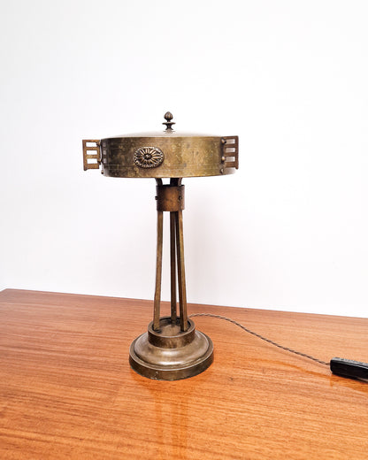 Vintage brass table lamp with sculptural base and decorative detailing, professionally tested, showing worn patina to brass with aged character