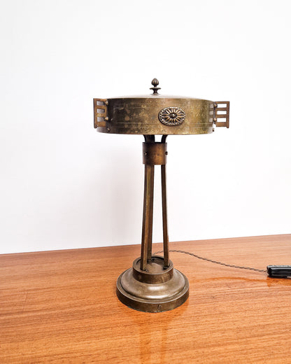 Vintage brass table lamp with sculptural base and decorative detailing, professionally tested, showing worn patina to brass with aged character