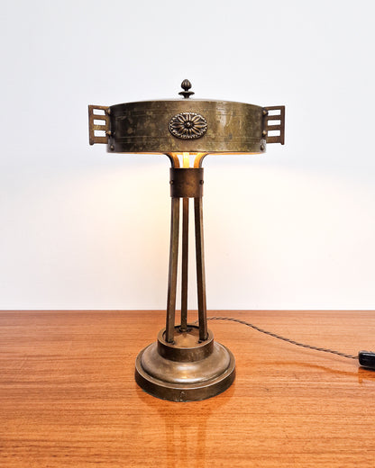 Vintage brass table lamp with sculptural base and decorative detailing, professionally tested, showing worn patina to brass with aged character