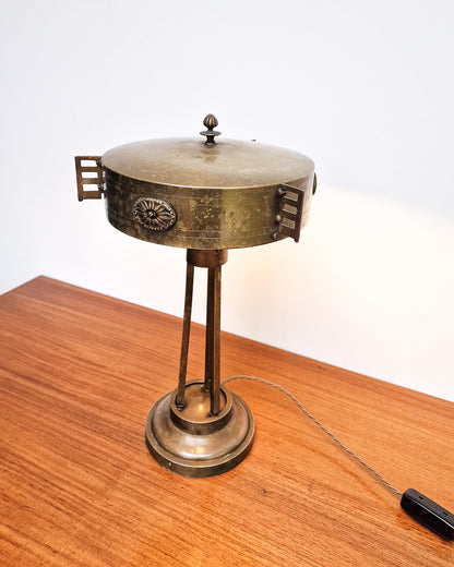 Vintage brass table lamp with sculptural base and decorative detailing, professionally tested, showing worn patina to brass with aged character