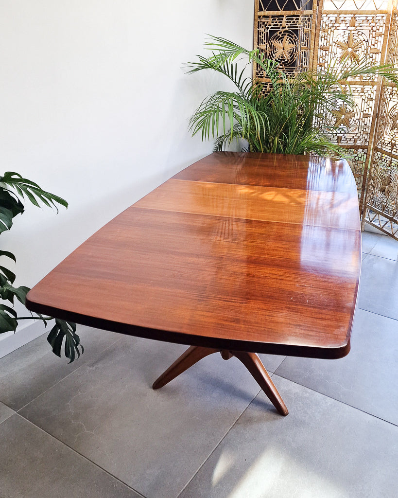 Vintage teak dining table with extension leaves, mid century Gordon Russell style table showing light age-related wear