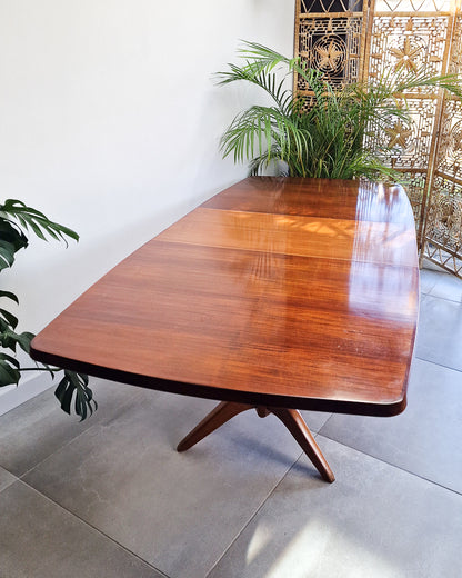 Vintage teak dining table with extension leaves, mid century Gordon Russell style table showing light age-related wear