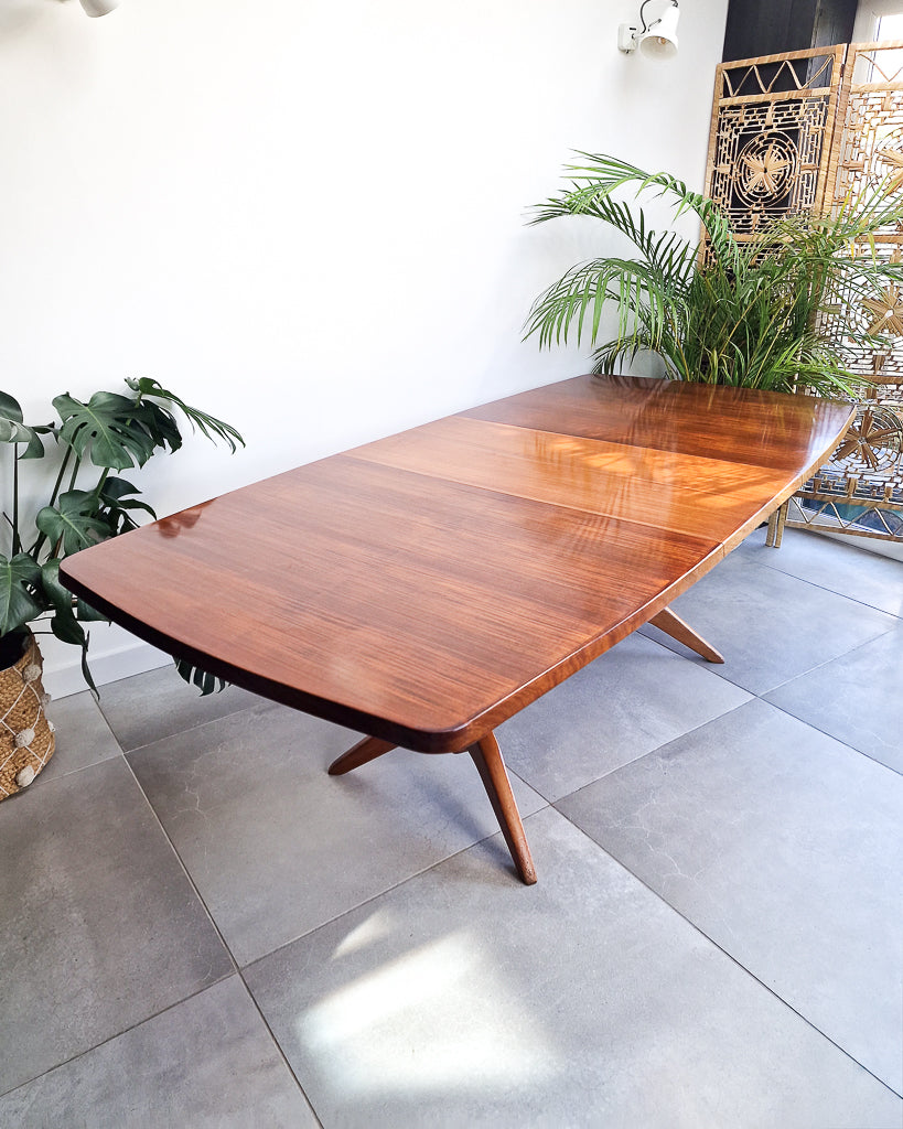 Vintage teak dining table with extension leaves, mid century Gordon Russell style table showing light age-related wear