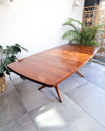 Vintage teak dining table with extension leaves, mid century Gordon Russell style table showing light age-related wear