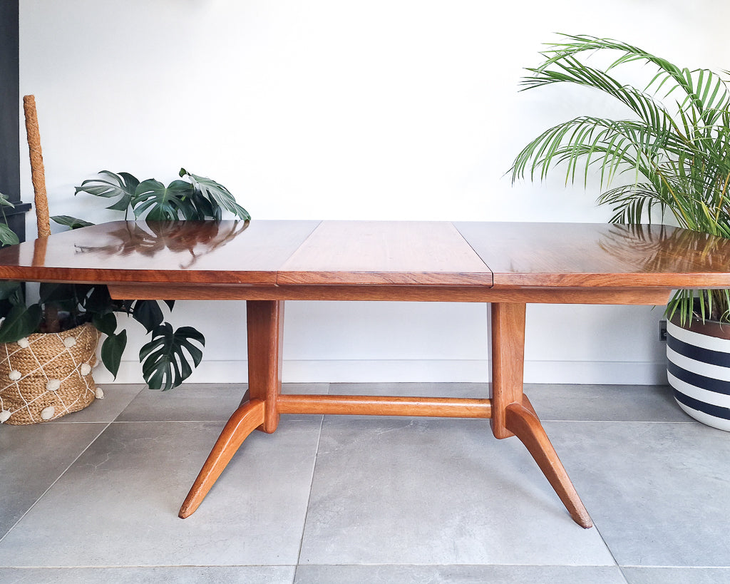 Vintage teak dining table with extension leaves, mid century Gordon Russell style table showing light age-related wear