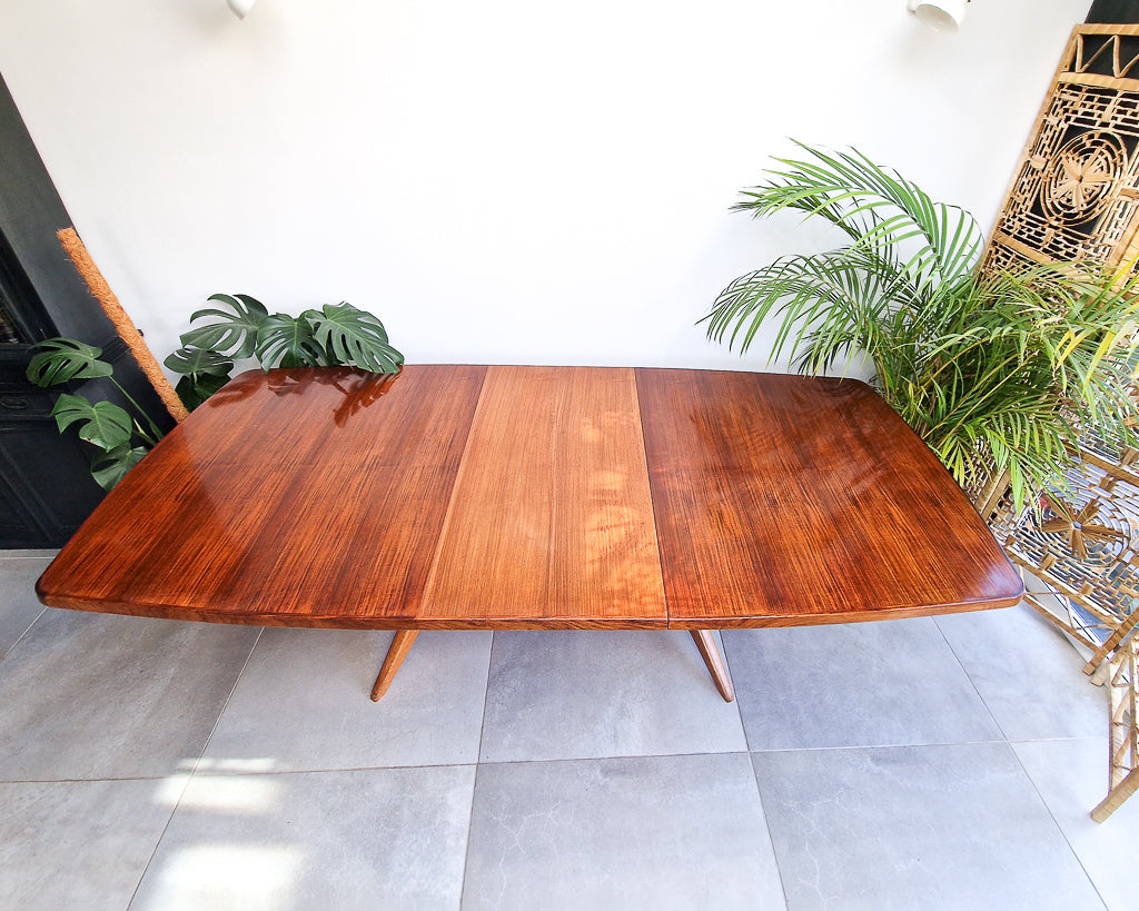 Vintage teak dining table with extension leaves, mid century Gordon Russell style table showing light age-related wear