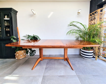 Vintage teak dining table with extension leaves, mid century Gordon Russell style table showing light age-related wear