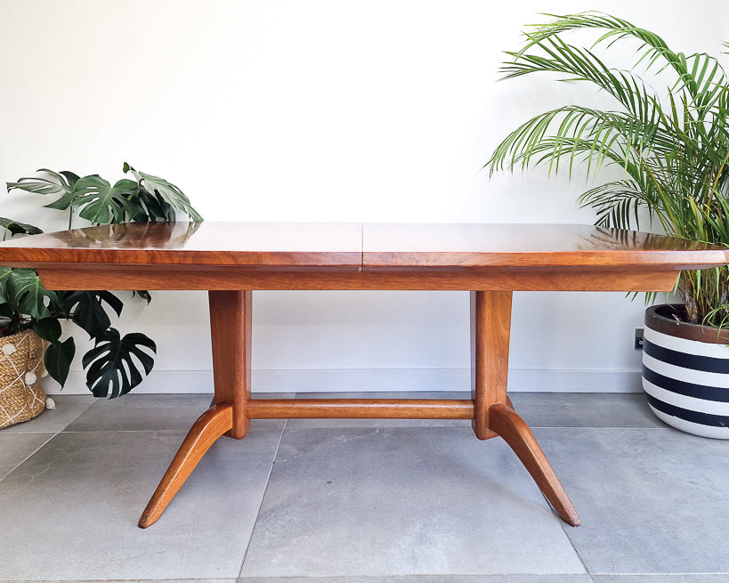 Vintage teak dining table with extension leaves, mid century Gordon Russell style table showing light age-related wear