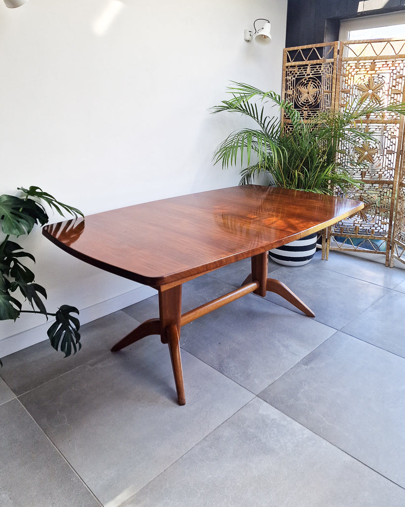 Mid century modern extendable teak dining table, British design with clean lines and minor surface marks