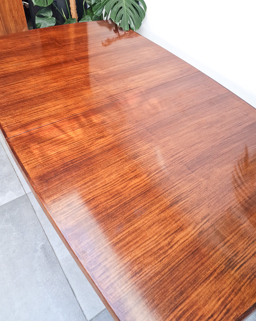 Mid century modern extendable teak dining table, British design with clean lines and minor surface marks
