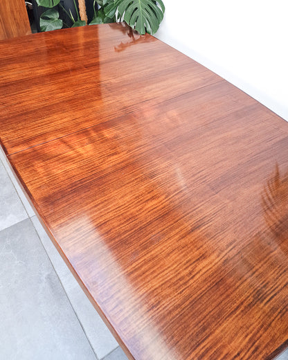 Mid century modern extendable teak dining table, British design with clean lines and minor surface marks