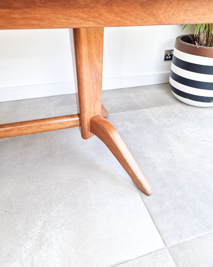 Mid century modern extendable teak dining table, British design with clean lines and minor surface marks