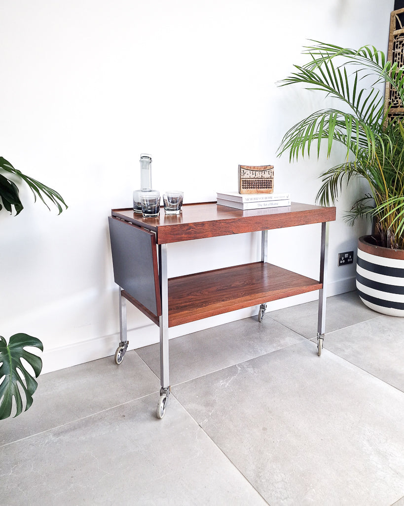 Mid century bar cart with rosewood shelves and chrome frame, vintage extendable cocktail trolley with minor surface marks