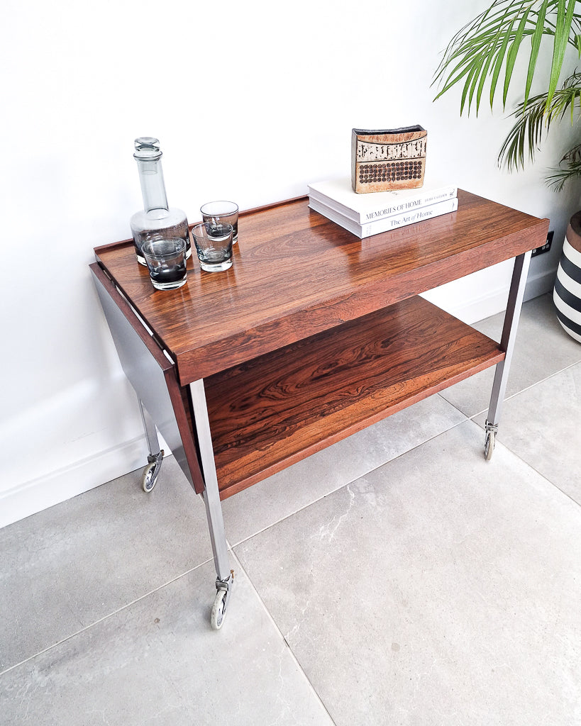 Mid century bar cart with rosewood shelves and chrome frame, vintage extendable cocktail trolley with minor surface marks