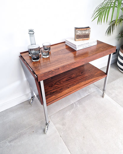 Mid century bar cart with rosewood shelves and chrome frame, vintage extendable cocktail trolley with minor surface marks