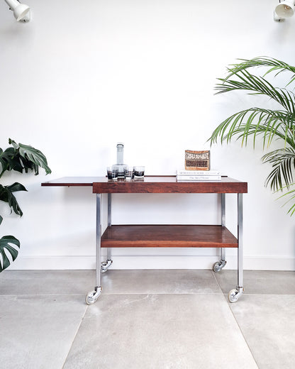 Mid century bar cart with rosewood shelves and chrome frame, vintage extendable cocktail trolley with minor surface marks