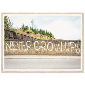 "Never Grow Up" Wooden Framed Poster