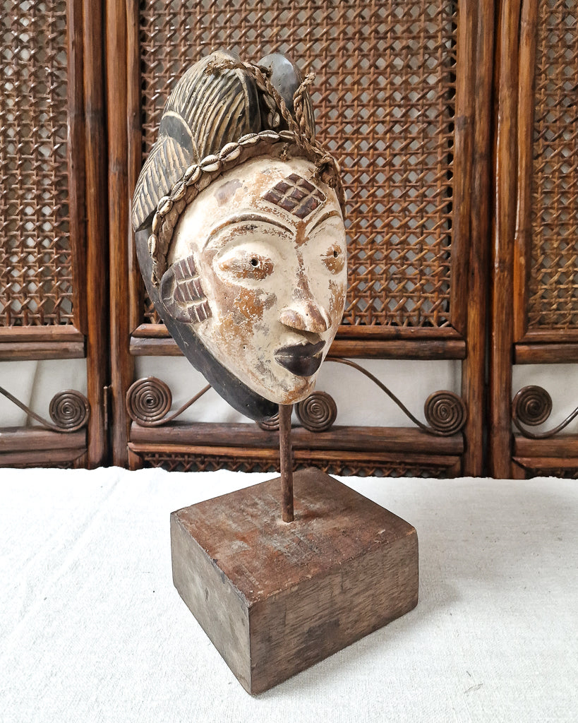 African Gabon Mask from the Punu tribe on stand