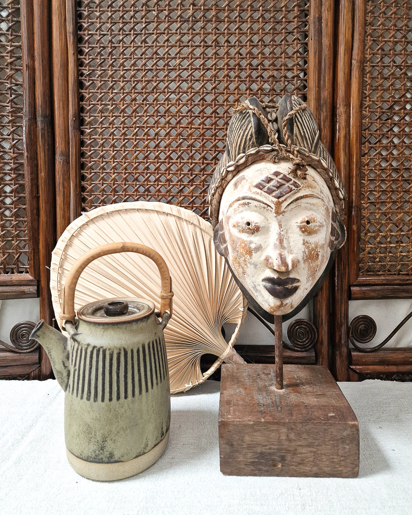 African Gabon Mask from the Punu tribe on stand