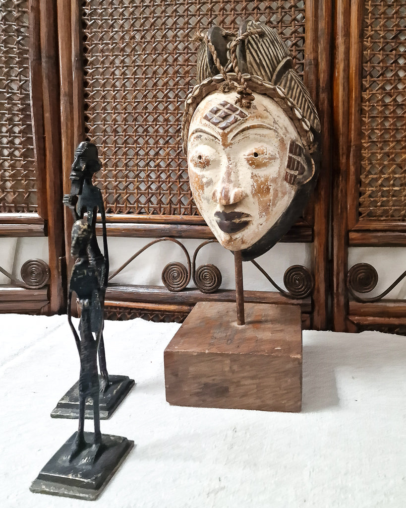 African Gabon Mask from the Punu tribe on stand