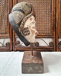 African Gabon Mask from the Punu tribe on stand