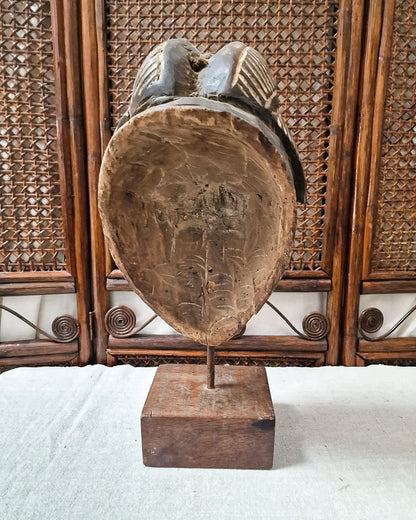 African Gabon Mask from the Punu tribe on stand