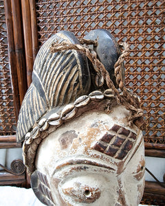 African Gabon Mask from the Punu tribe on stand